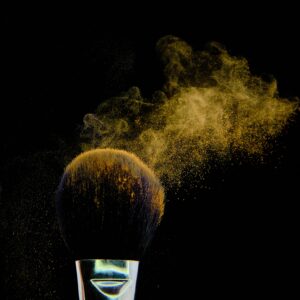 Beautiful shot of makeup brush isolated on black background Makeup Brush